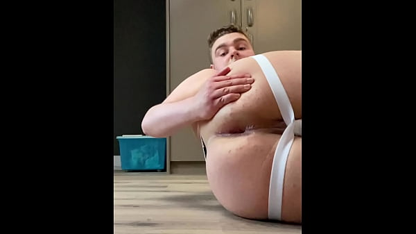 Gay young chubby 21 y/o in jockstrap stretches his hole using a butt plug, anal beads and a dildo and fingers himself