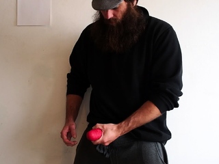 Man, with a 10,5 inch red dildo