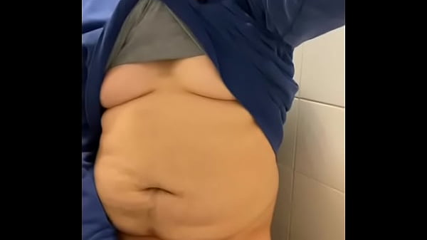 Gay young chubby guy Adrien jerks off in public bathroom stalls and shows off his body