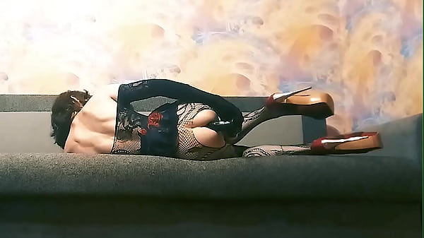 Crossdresser slut fucks herself with big black dildo