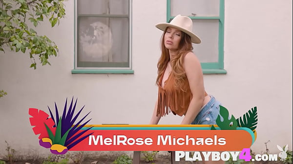 Beautiful redhead MILF model MelRose Michaels shows her big natural tits